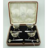 A cased set of four silver salts, modelled as cauldrons, with servers Birmingham 1863, 184 grams