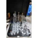 A quantity of cut glass and crystal, including nautical themed drinking glasses, decanters, ewers,