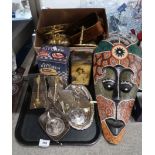 A painted wooden ethnic mask, storage tins, golf club book ends, white metal trinket dishes,