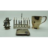 A lot comprising a silver toast rack, Sheffield 1930, a silver christening mug, London 1937, a