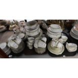 A large Noritake Raleigh pattern dinner service comprising tureens, serving plates, cups and