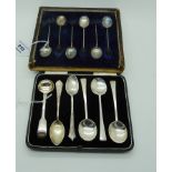 A lot comprising a cased set of six silver coffee bean spoons, Birmingham 1924, with a mixed lot Six