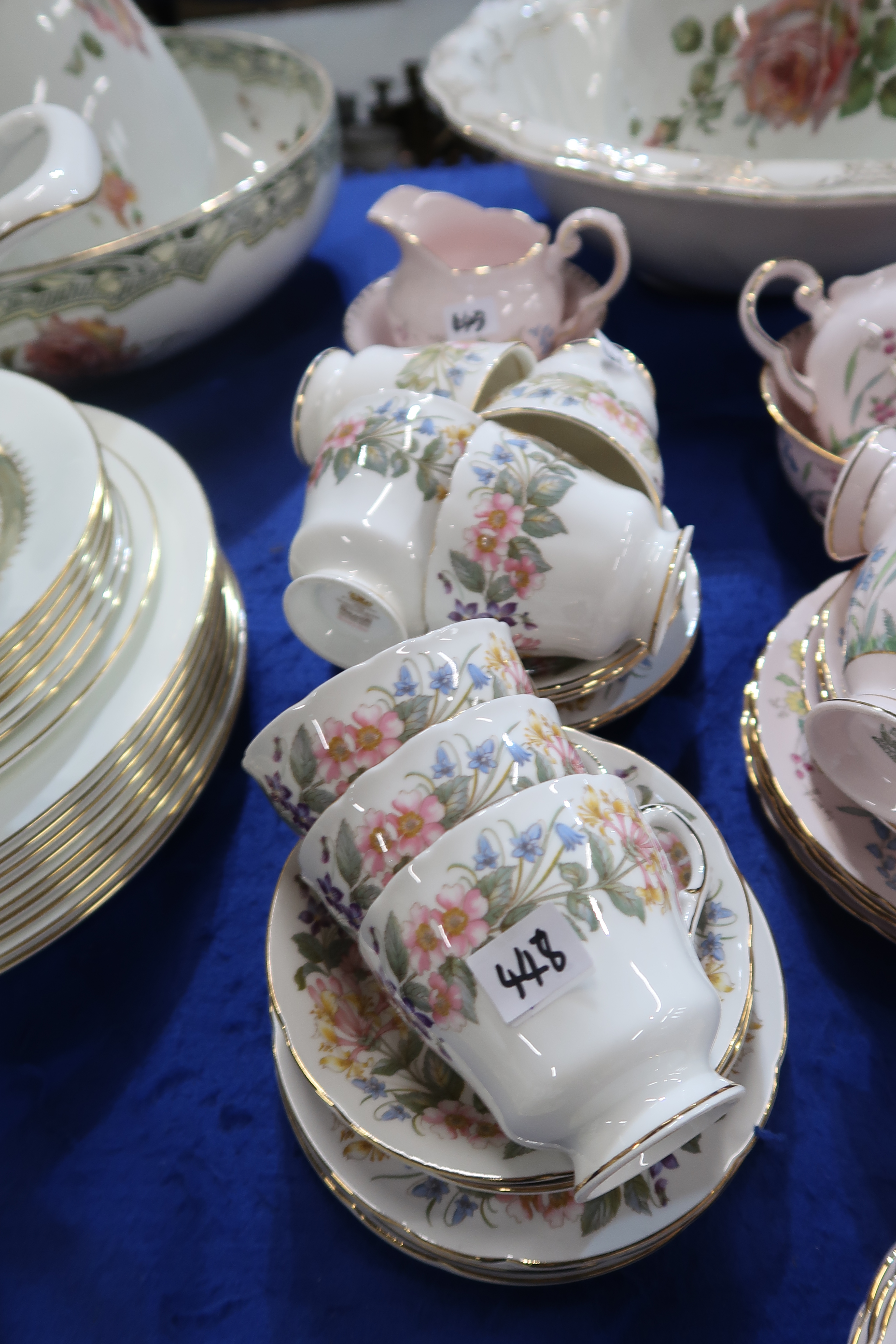 A Tuscan China teaset, the pink ground with flower decoration, comprising twelve cups, saucers and - Image 2 of 2