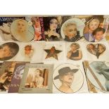 An unusual collection of Madonna vinyl records with picture shape discs W 8881 P, W8848P, W9260P,