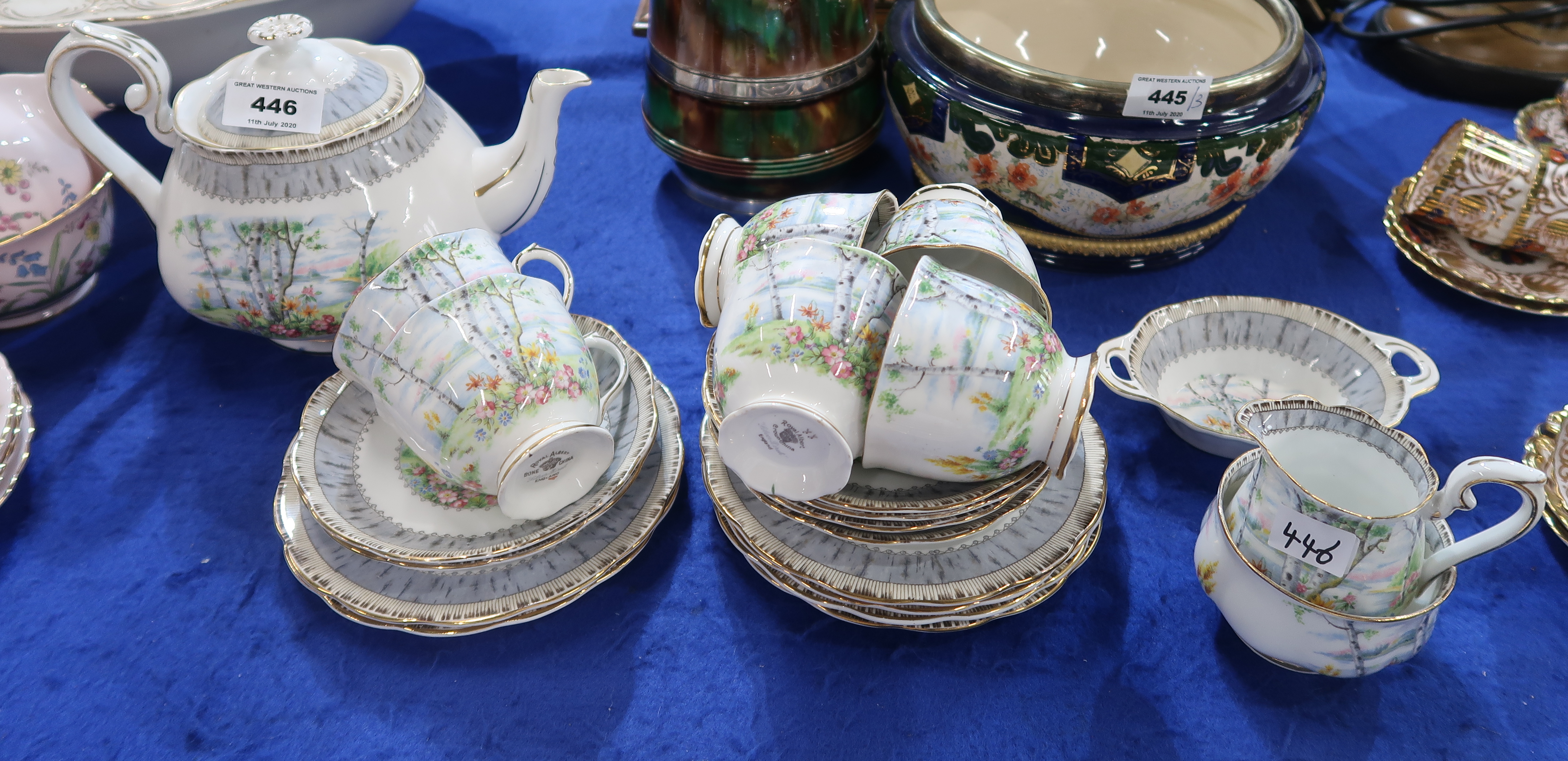 A Royal Albert Silver Birch teaset comprising six cups and saucers, plates, jam dish, teapot, milk