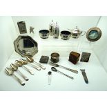 A lot comprising a 5 piece silver condiment set, Birmingham 1930, a silver napkin ring, a silver