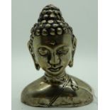 A white metal bust of Buddha 12cm high Condition Report: Available upon request