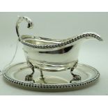 A silver sauceboat on stand 16,5 cm long 460 grams total Condition Report: Available upon request