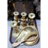 A selection of brassware including four pairs of candlesticks, one pair with barley twist motif,