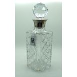 A cut glass decanter with silver collar Birmingham 1967 27.5cm. high Condition Report: Available