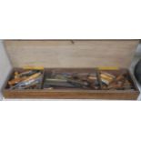 A wooden box with carpenters tools, 9cm high x 83cm wide x 23cm deep Condition Report: Available