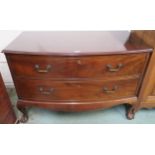 A mahogany bow front two drawer chest on ball and claw feet, 79cm high x 116cm wide x 66cm deep