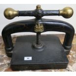 A cast iron bookpress, 32cm high x 42cm wide x 26cm deep Condition Report: Available upon request