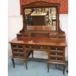 A Waring & Gillow Ltd inlaid mahogany dressing table with swivel mirror, two small drawers over a