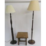 A mahogany standard lamp with barley twist column, an oak standard lamp and a side table (3)