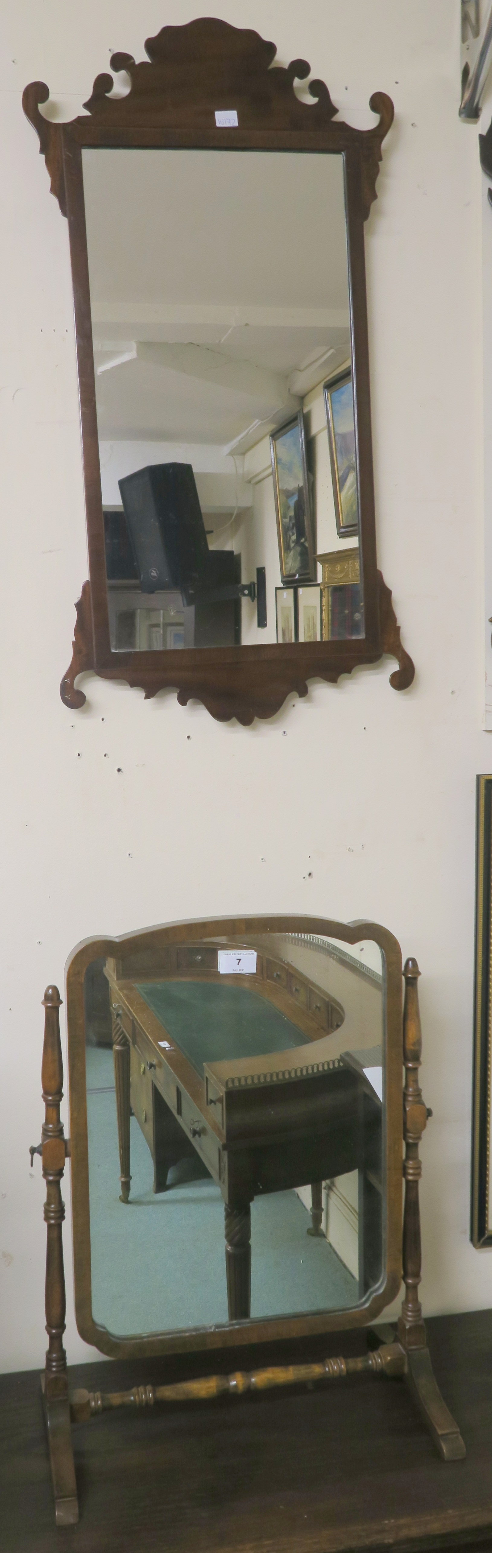 A Georgian style walnut wall mirror and a walnut toilet mirror (2) Condition Report: Available