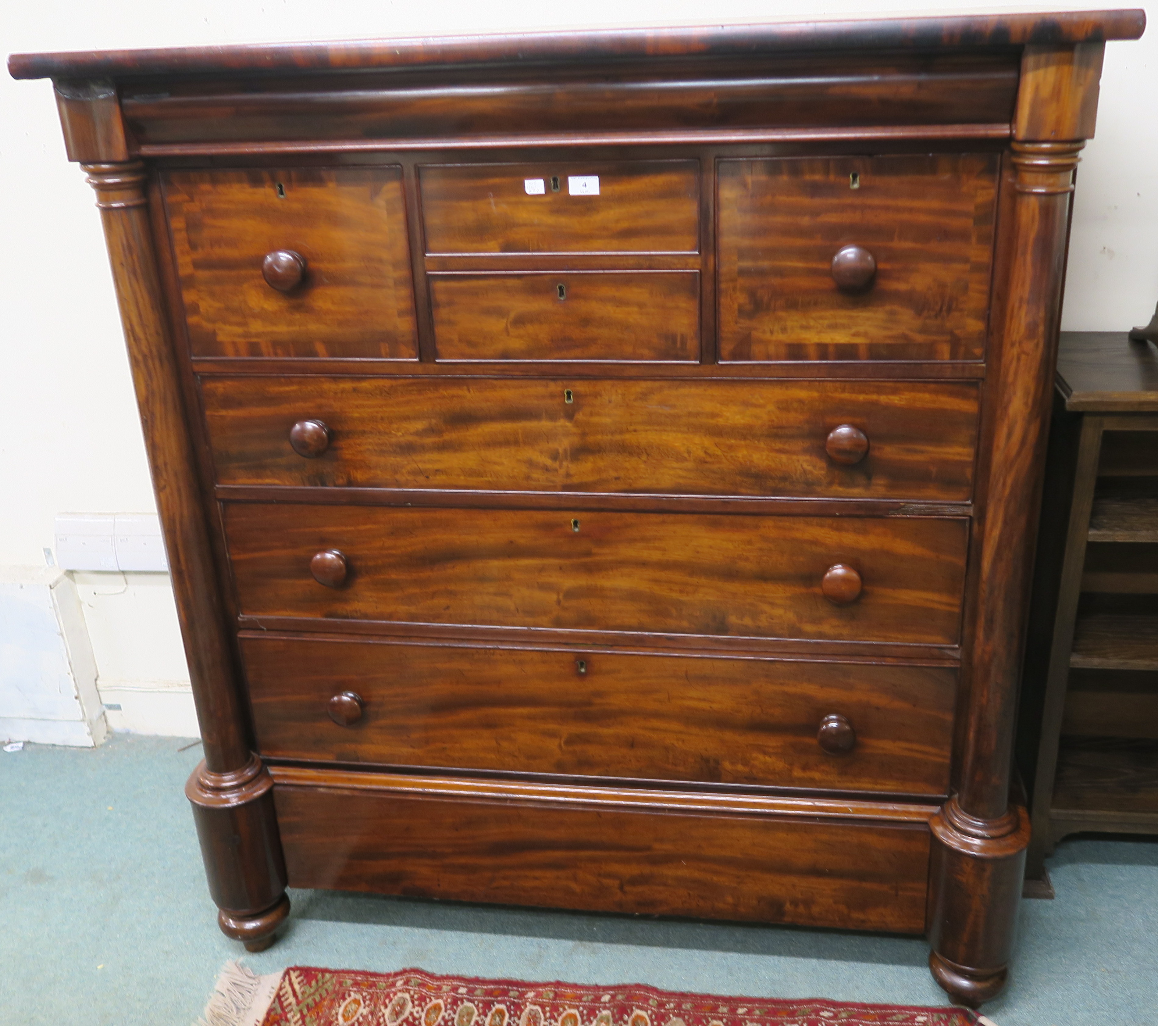 A Victorian mahogany ogee chest with frieze drawer over two small drawers flanked by two drawers