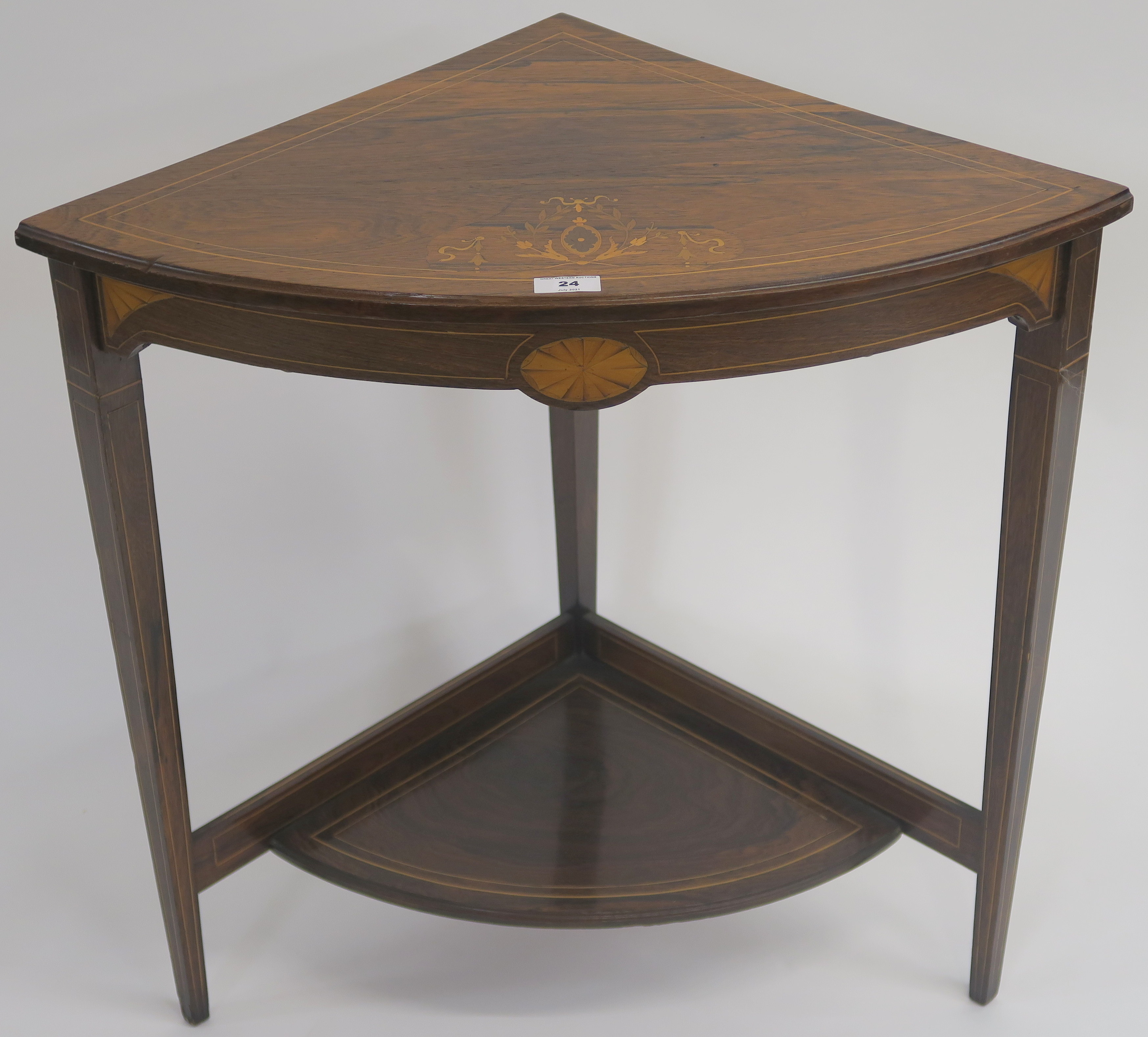 A small rosewood inlaid corner table with lower shelf, 68cm high x 70cm wide x 48cm deep Condition