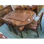 A reproduction mahogany twin pedestal dining table with two carvers and four chairs.(7) Condition