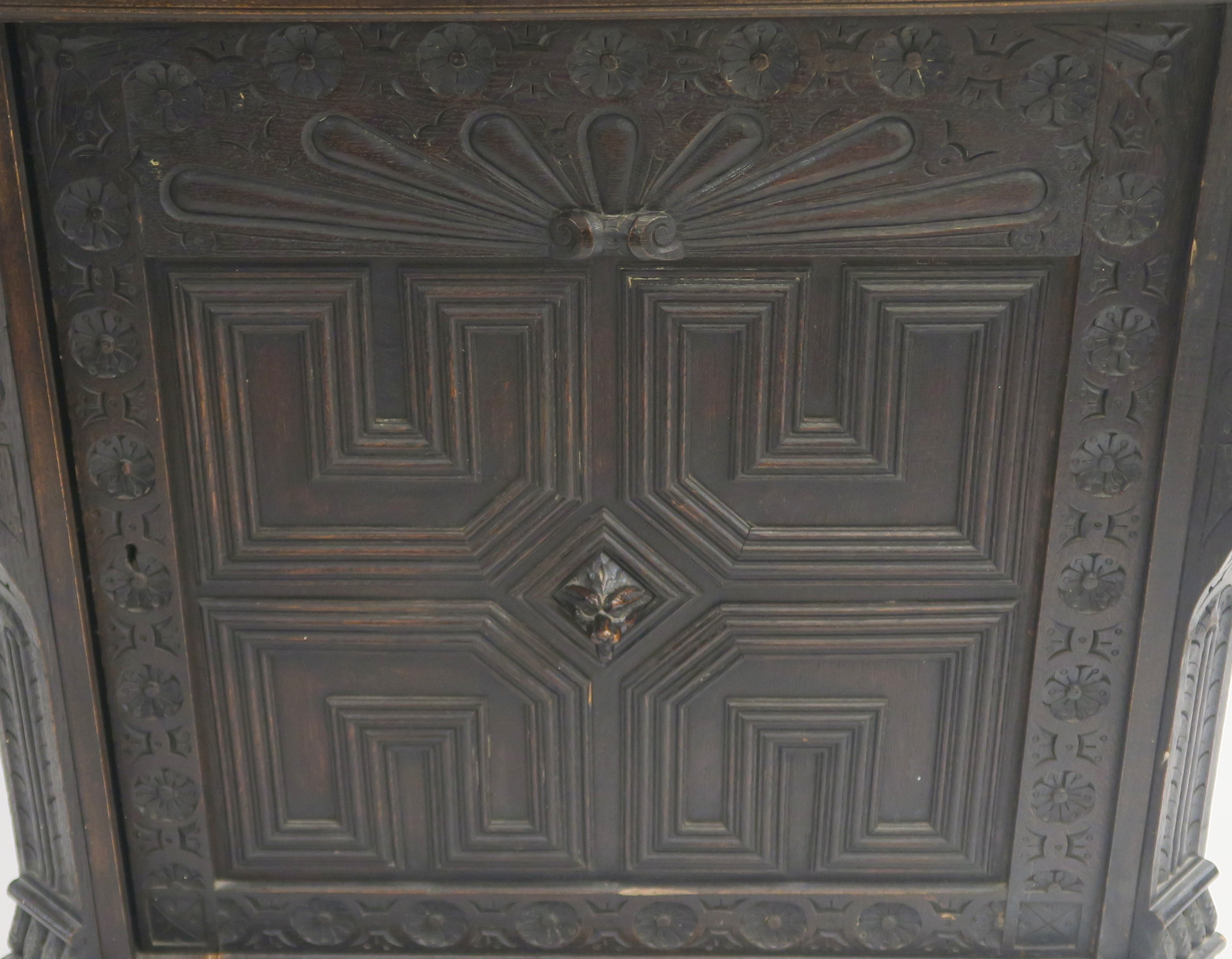 A Continental oak corner cabinet with single carved frieze drawer with mask handle over a carved - Image 2 of 3