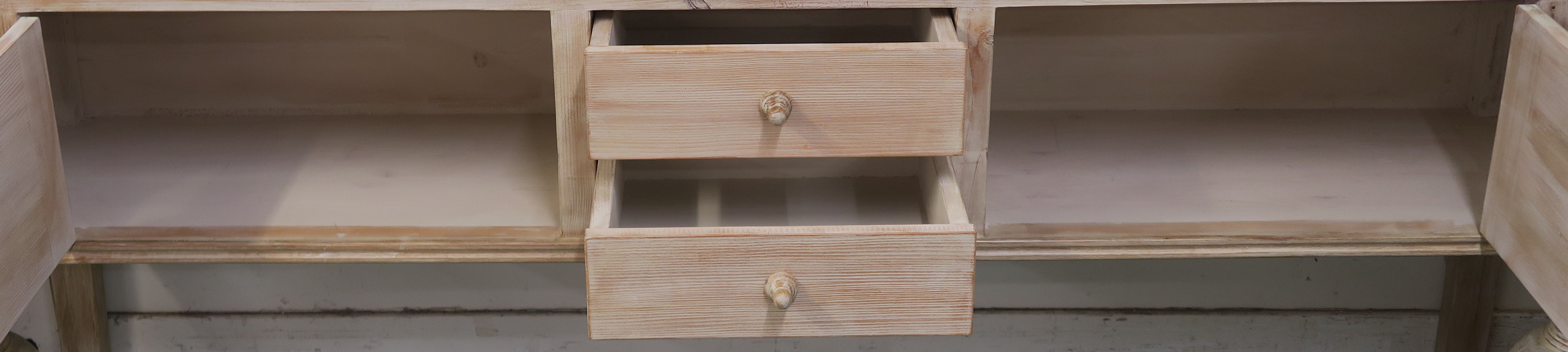 A modern limed pine console table with two drawers flanked by two doors with baluster shaped - Image 3 of 3