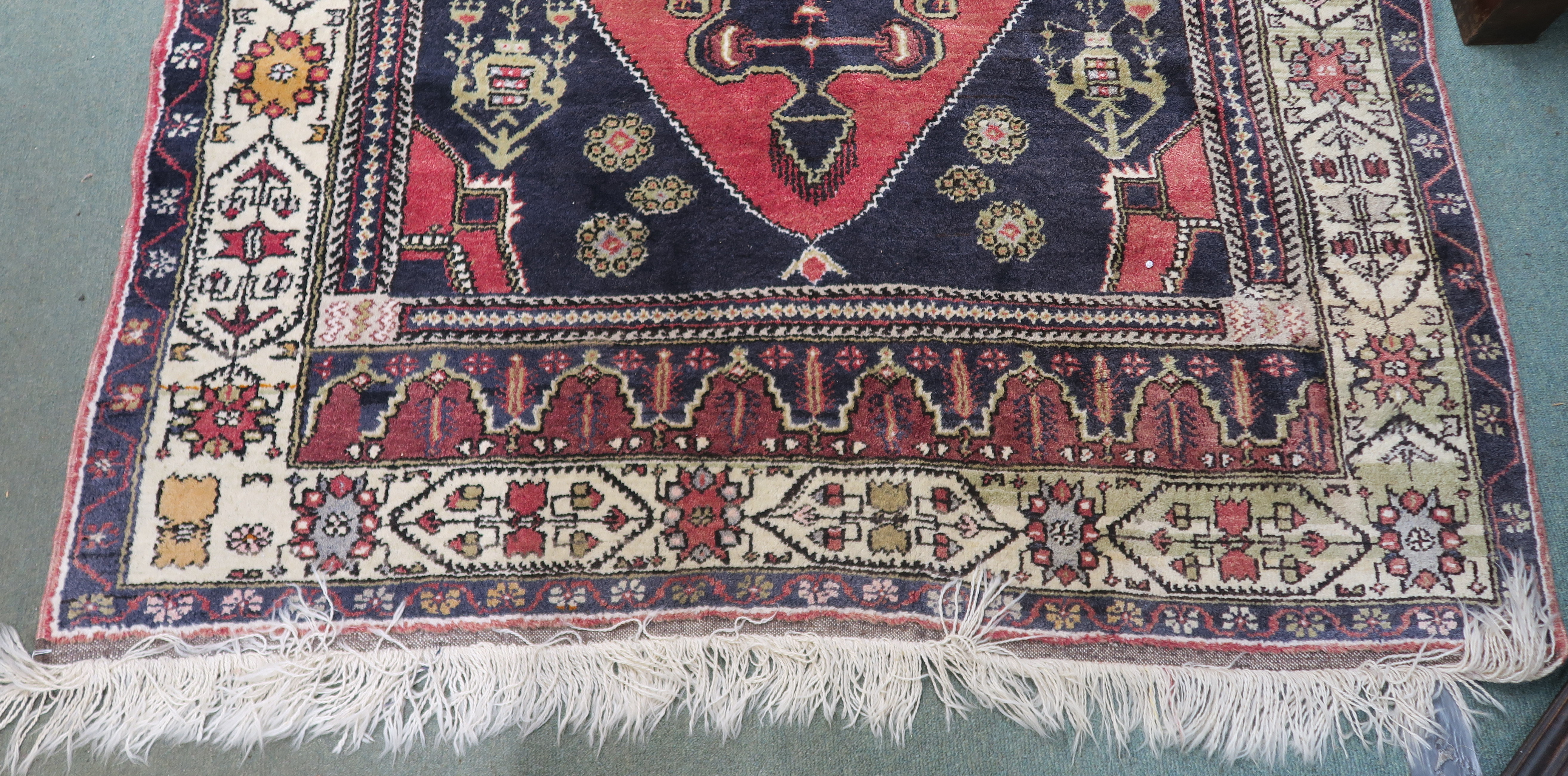 A blue ground Turkish Anadol wool rug with geometric design within a cream border, 250cm x 156cm - Image 3 of 6