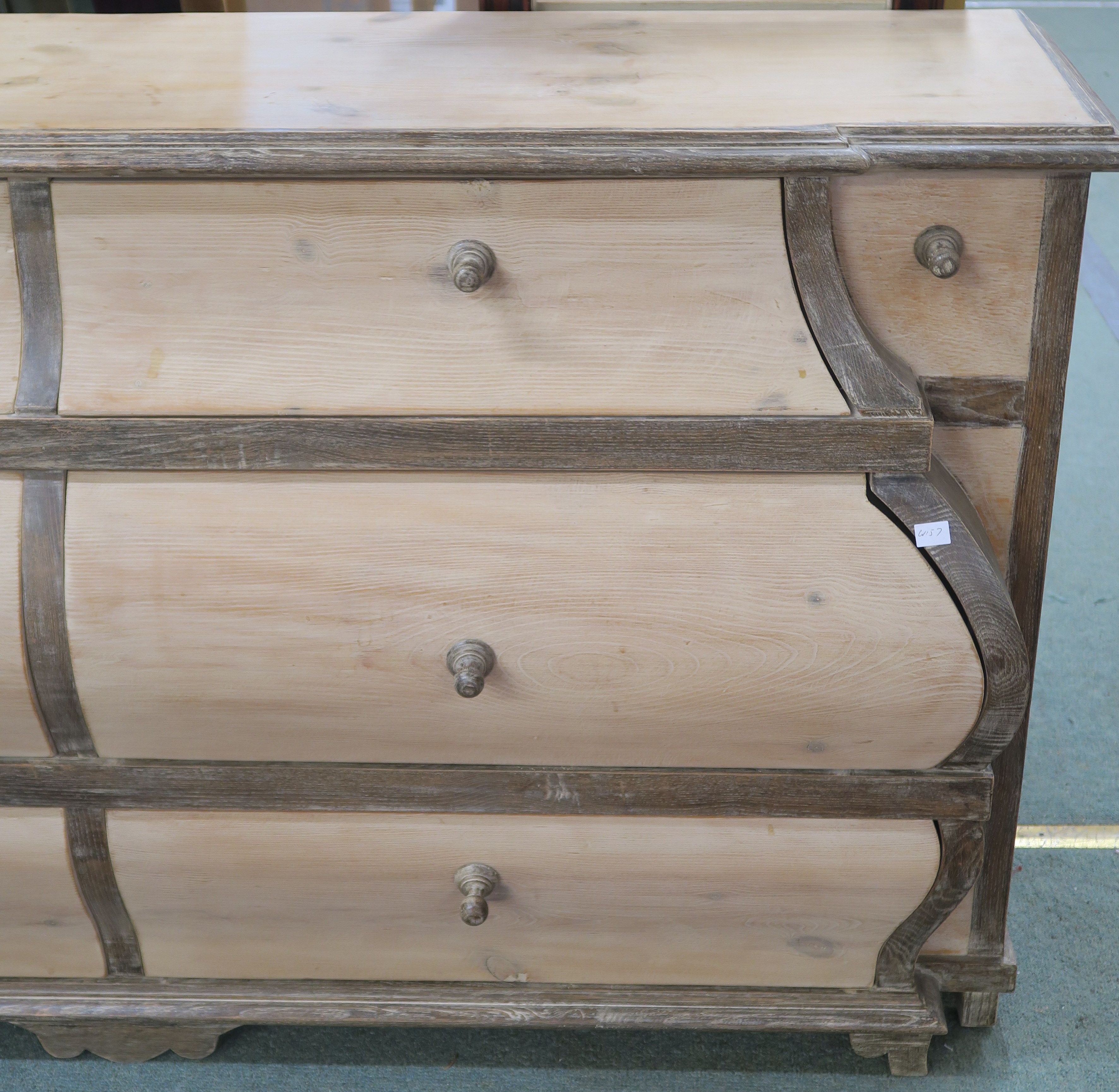 A modern limed pine bombe shaped sideboard with nine drawers, retailed by Design Works, Interior - Image 2 of 6