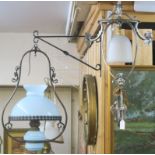 A metal hanging oil lamp with blue shade and a corner wall light (2) Condition Report: Available