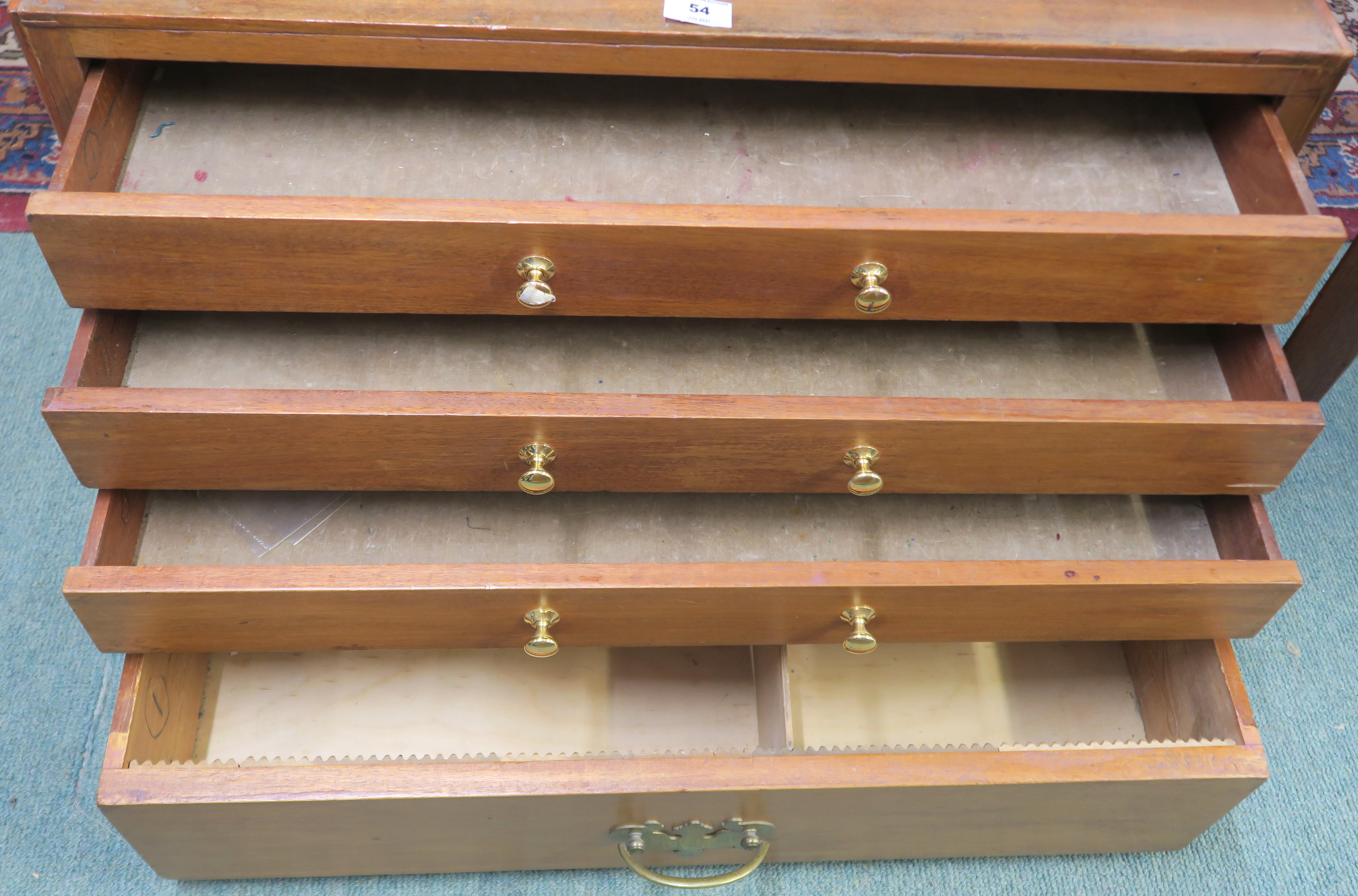 A teak and pine collectors cabinet with four drawers and brass campaign style brass side handles, - Image 2 of 2