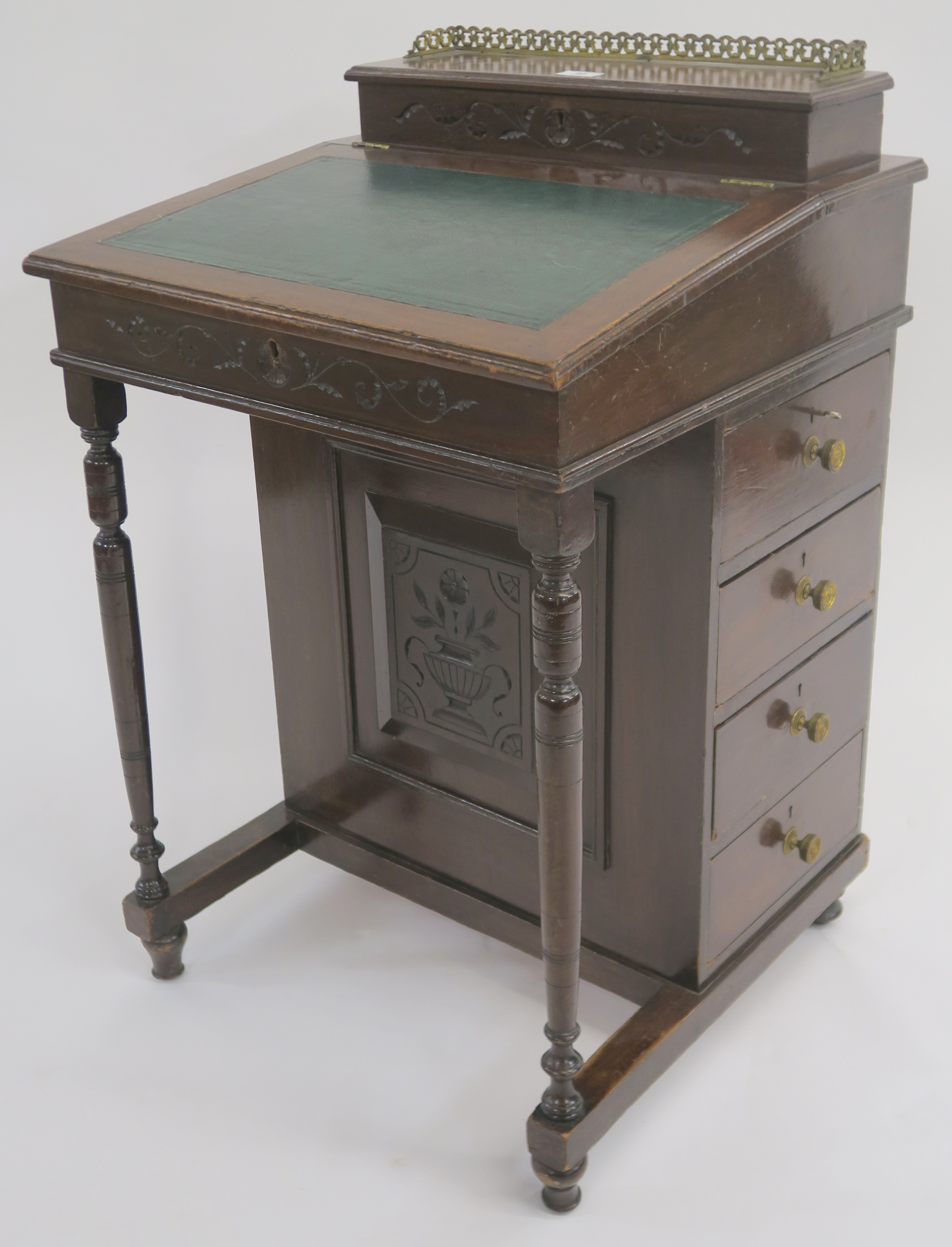 A reproduction mahogany davenport with green skiver and four side drawers Condition Report: