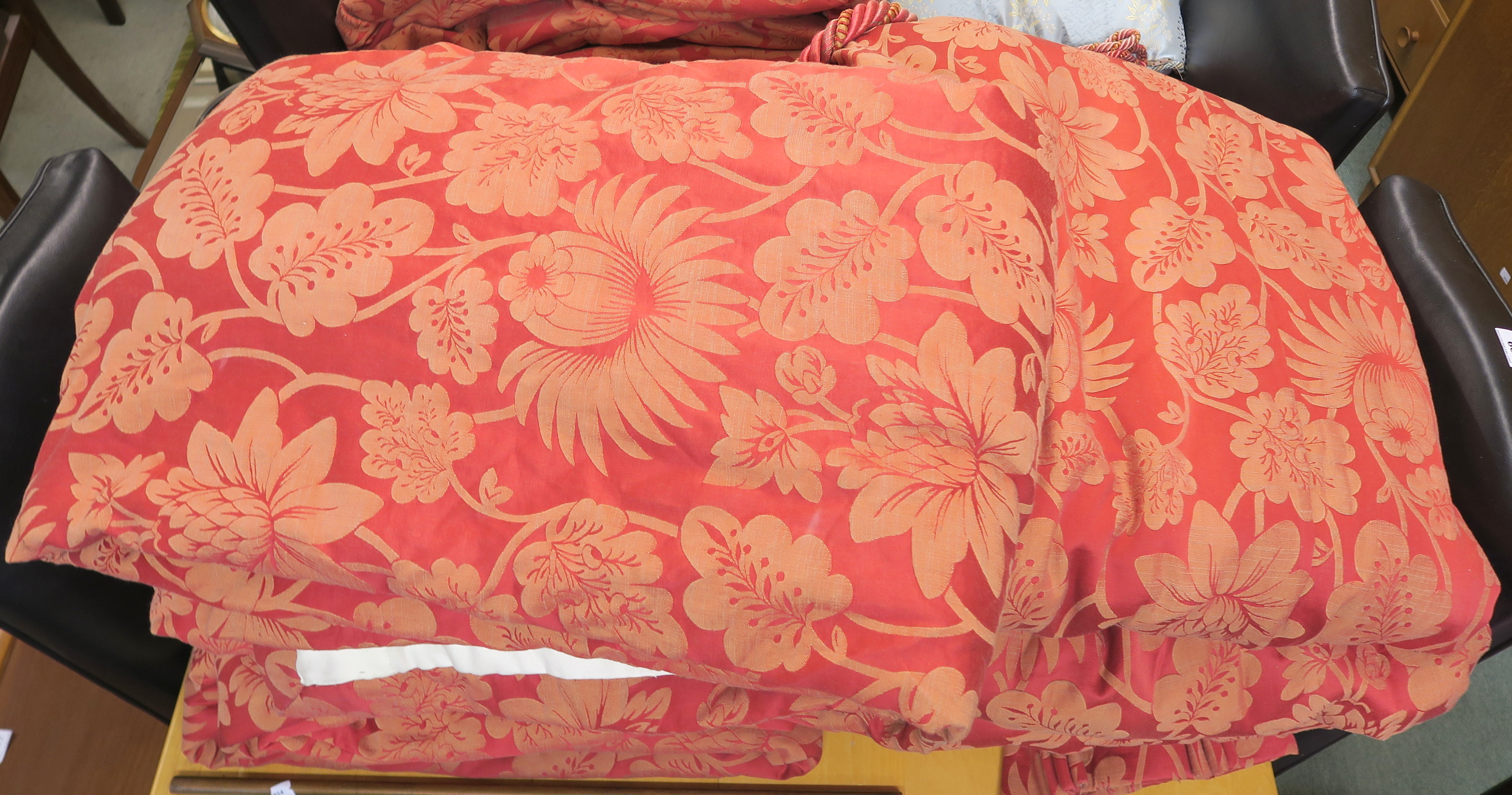Five pairs of mid red with woven orange flowers pattern curtains, four pairs 180cm wide x 230cm drop