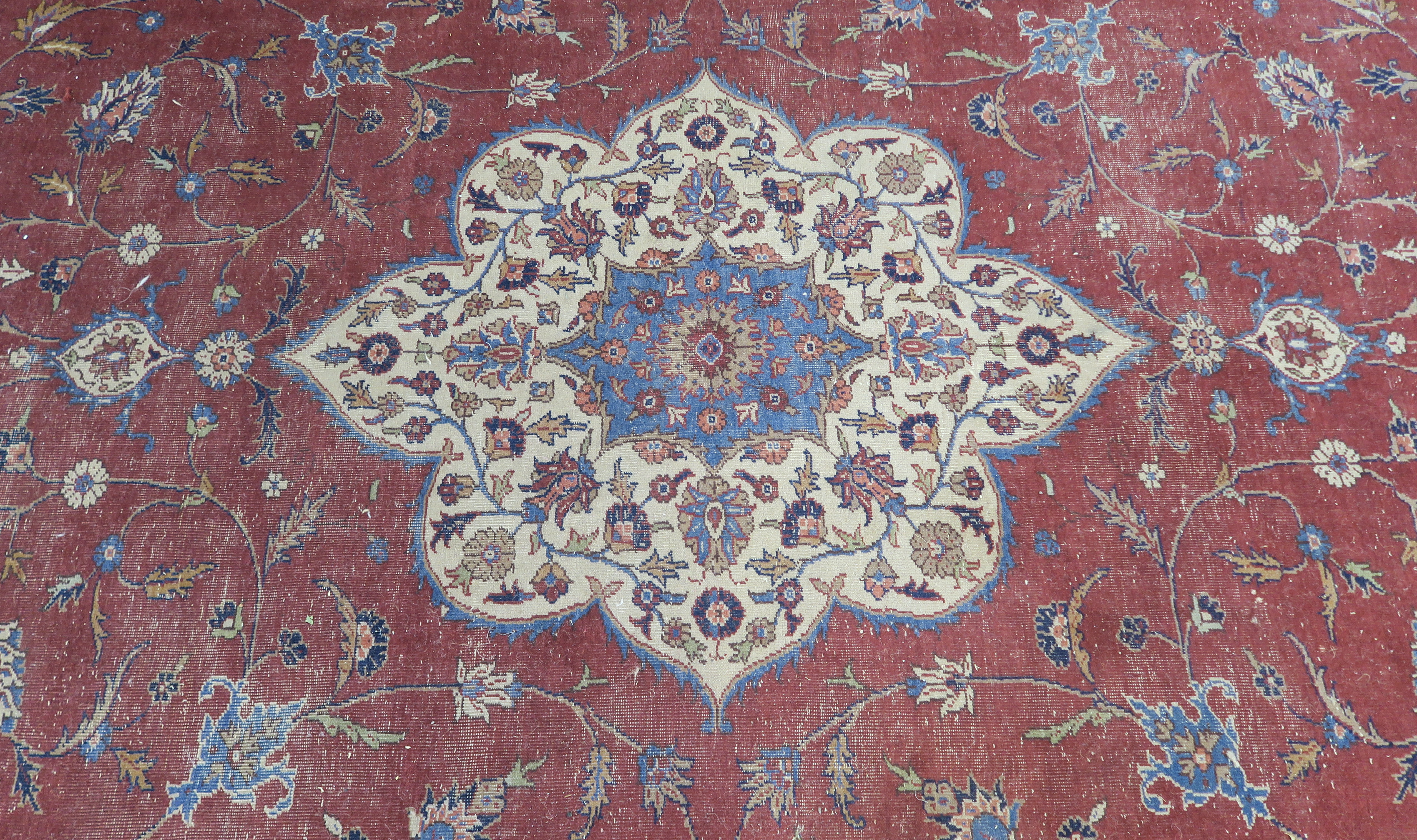 A large Turkish tabriz rug, red ground with central medallion and spandrels with animals and birds - Image 2 of 8