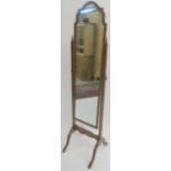 A walnut cheval mirror, 163cm high Condition Report: