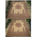 Two large beige ground rugs with central medallion rugs. 359cm x 273cm (2) Condition Report: