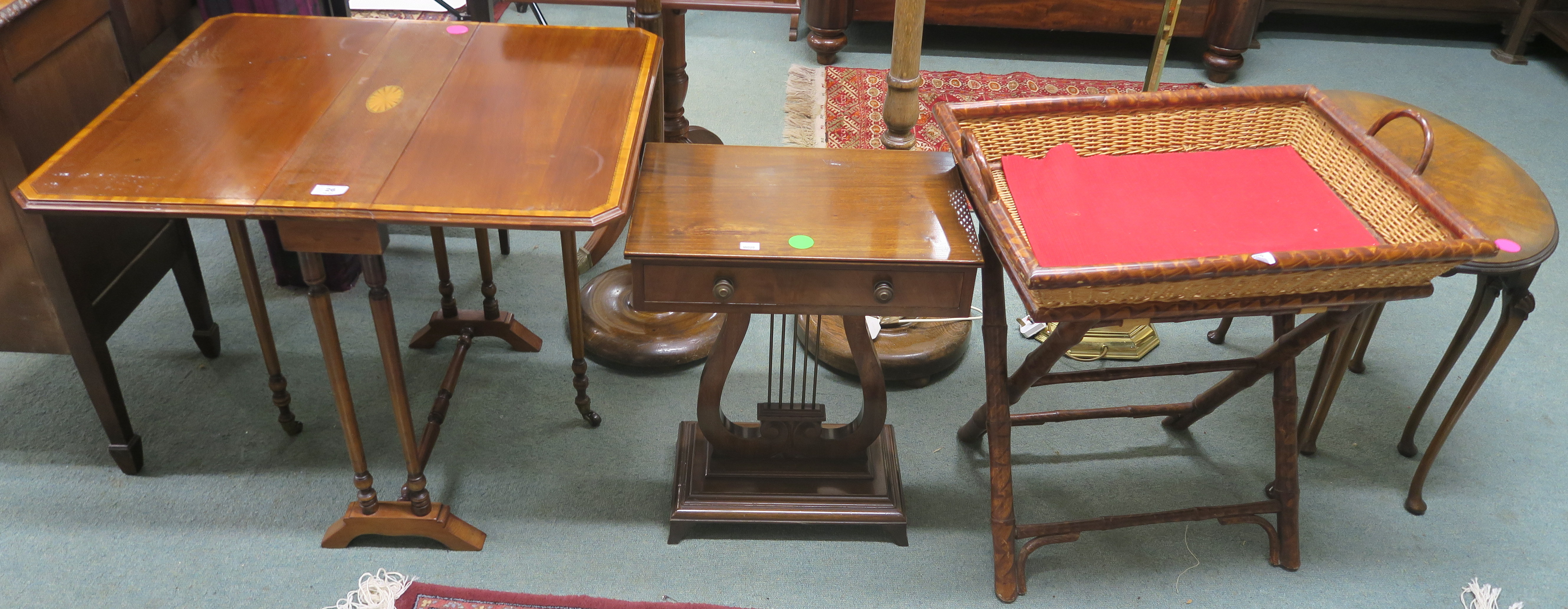 A small inlaid mahogany sutherland table, reproduction side table, tray and stand and a nest of