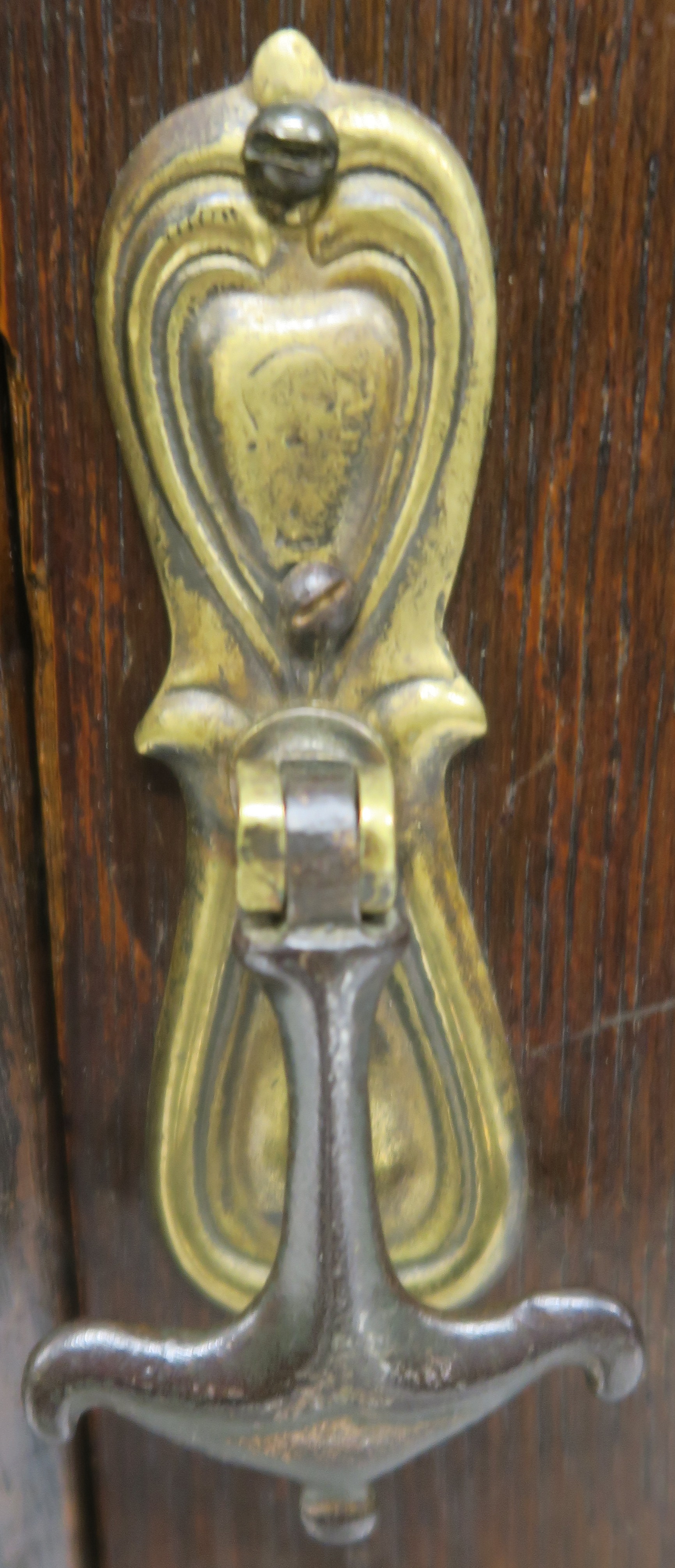 A Liberty & Co oak corner cabinet, the upper section having leaded glazed door over open shelf on - Image 5 of 8