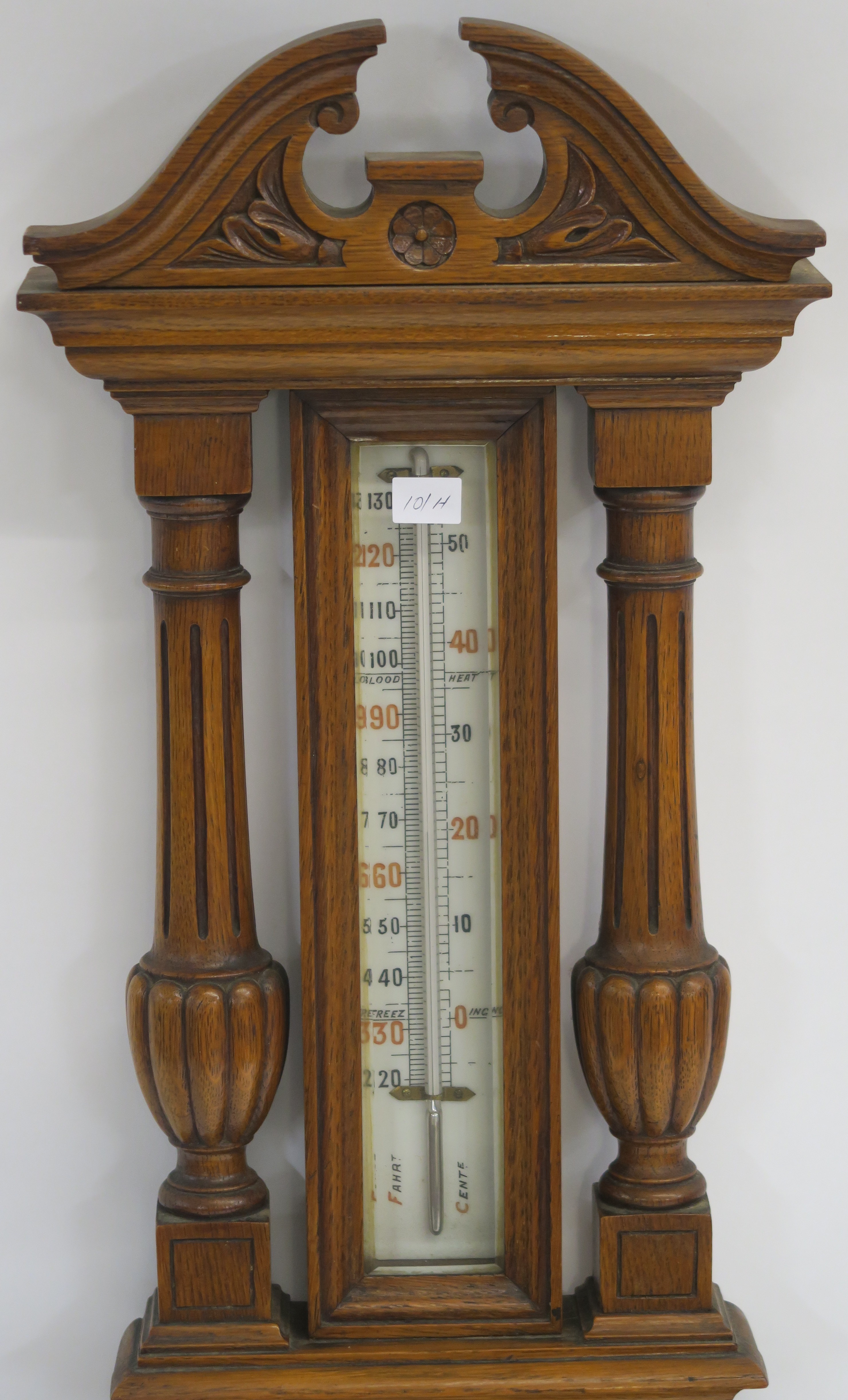 A Victorian carved oak thermometer/barmometer, 101cm high Condition Report: Available upon request - Image 2 of 4