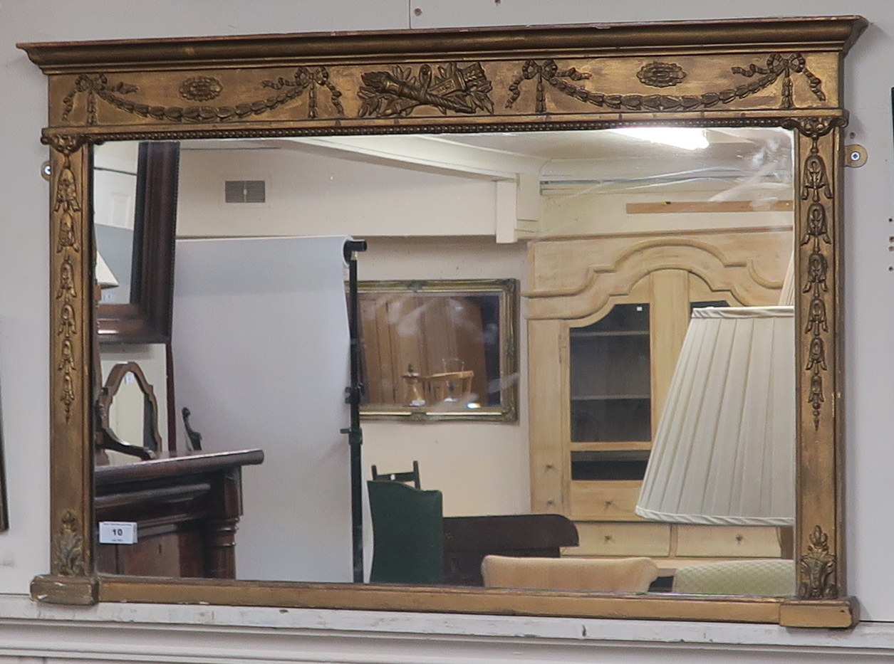 A gilt over mantle mirror, 58cm high x 87cm wide Condition Report: Available upon request