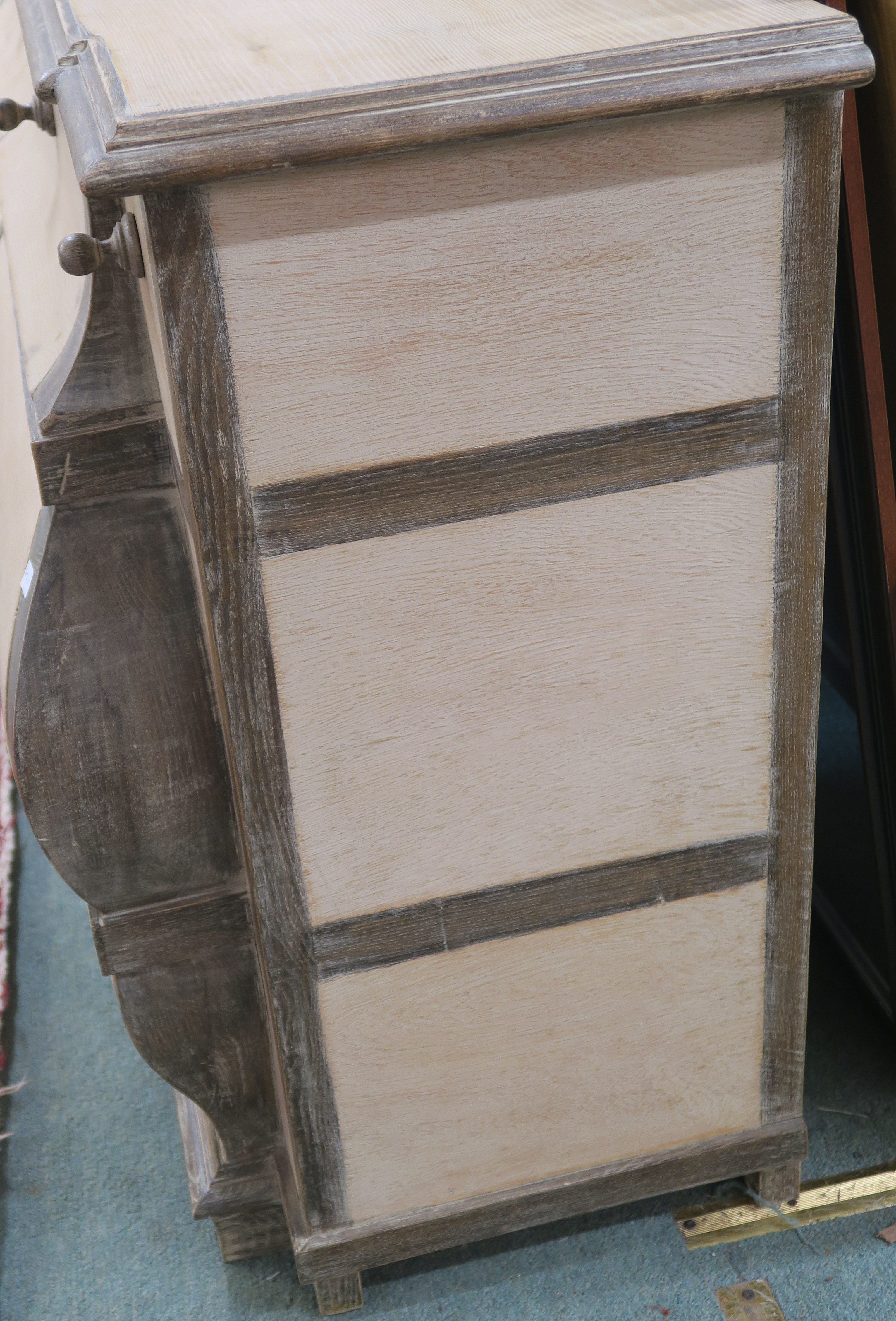 A modern limed pine bombe shaped sideboard with nine drawers, retailed by Design Works, Interior - Image 6 of 6