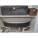 A cast iron bow front fender, 23cm high x 120cm wide. A metal deed box and a selection of locks