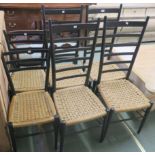 A set of four black ladder back chairs with string seats for Rooksmoor Mills, Stroud and a pair of