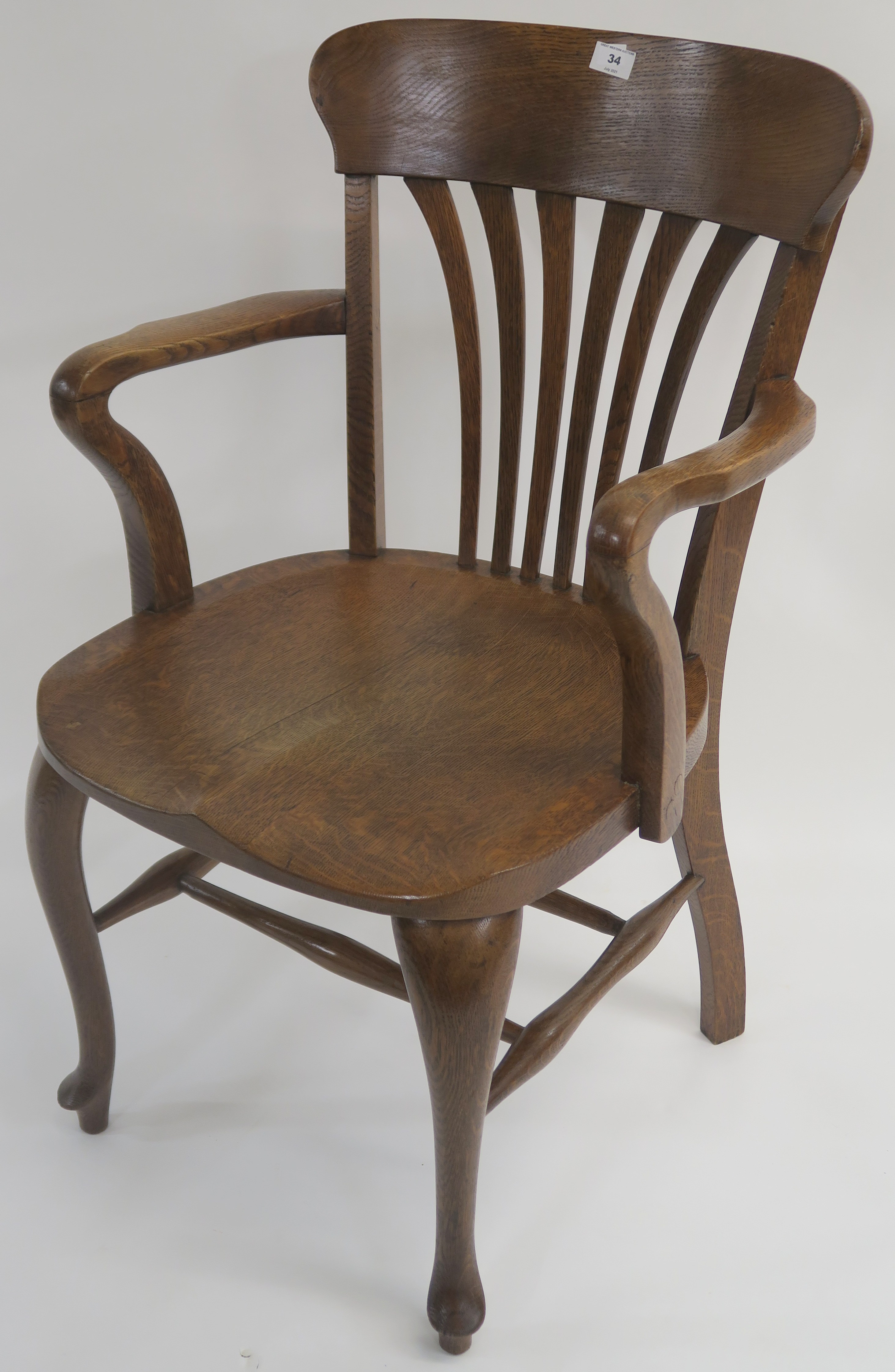 An early 20th Century oak office chair Condition Report: Available upon request