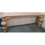 A modern limed pine console table with baluster supports, retailed by Design Works, Interior