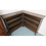 An oak open corner bookcase, 94cm high x 122cm wide x 122cm deep Condition Report: