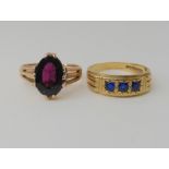 A 9ct gold garnet ring size P, together with a blue gem set ring size R1/2, weight together 8.3gms