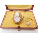 A 9ct gold cameo ring size S1/2, weight 2.1gms, together with a rolled gold cameo brooch Condition