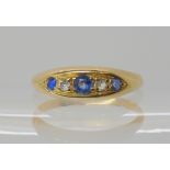 An 18ct gold blue gem and diamond ring circa 1864, size J1/2, weight 1.9gms Condition Report: