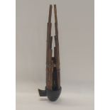 A 20th century Chinese Sheng bamboo musical instrument featuring bamboo pipes with an ebonised and