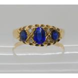 An 18ct sapphire and diamond accent ring size Q, weight 2.3gms Condition Report: Available upon