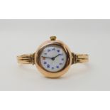 A 9ct gold vintage ladies watch (the movement replaced with a battery operated example) back of